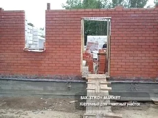 Строительство дома под ключ: частный дом, кладка стен крупным планом — Южно-Сахалинск, Сах-Строй-Маркет